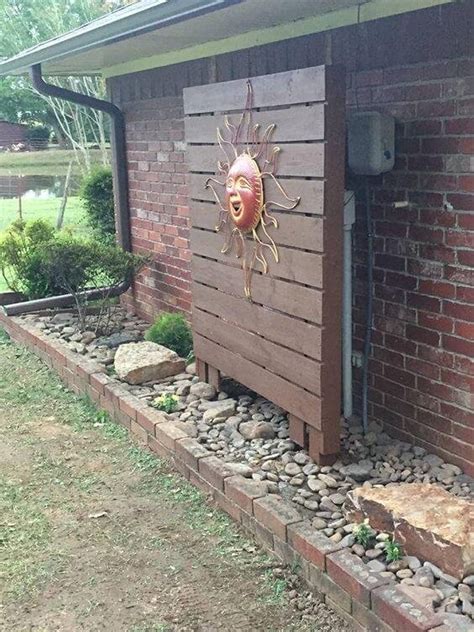 how to conceal my outside electrical box|hiding utility boxes in yard.